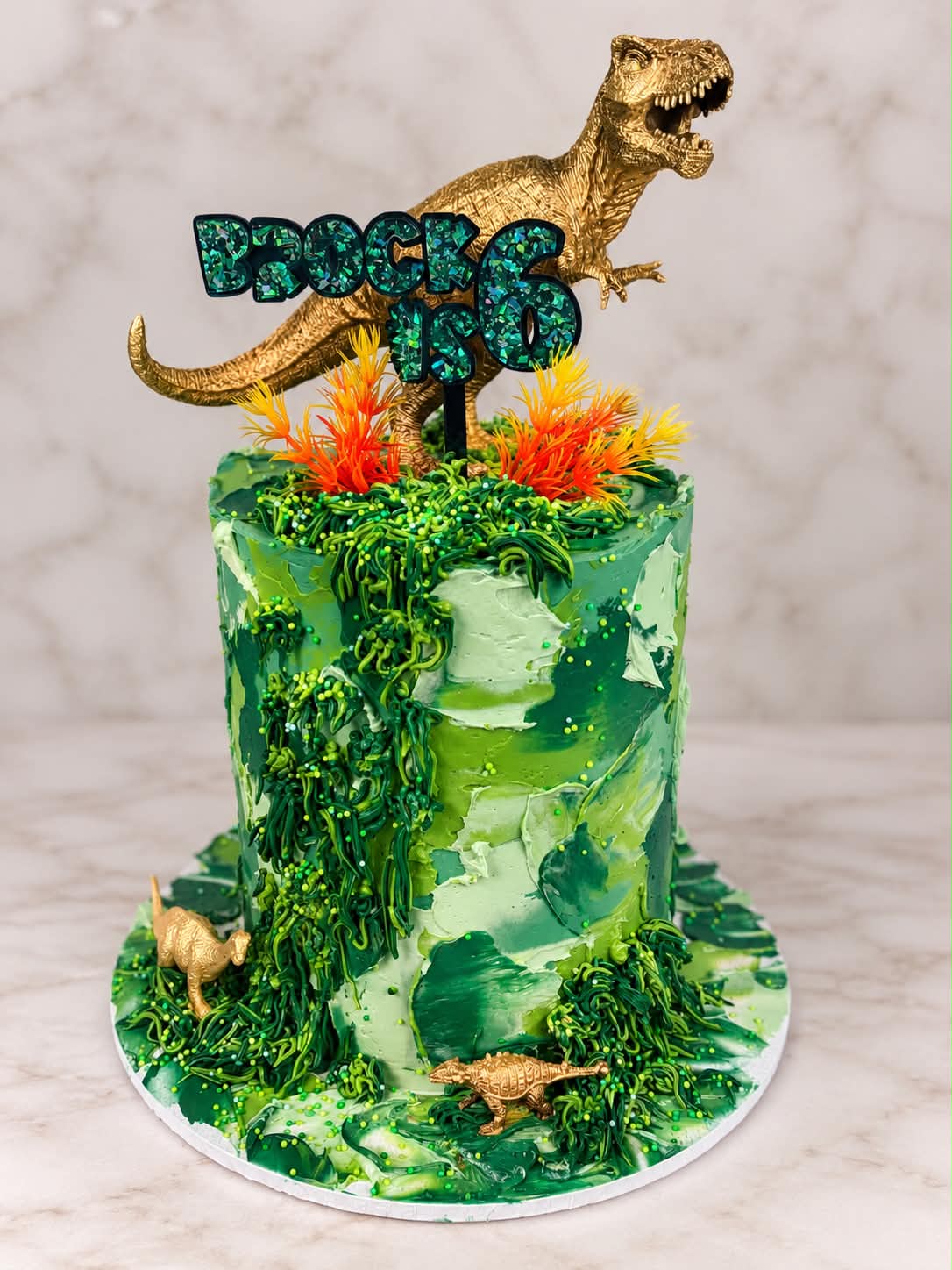 Dinosaur themed children's birthday cake