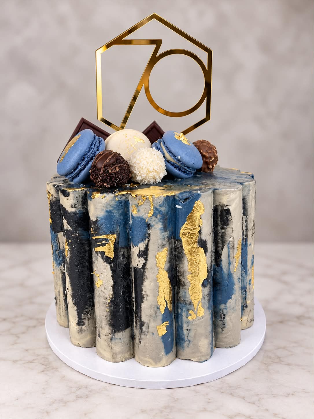Blue and gold 70th birthday celebration cake