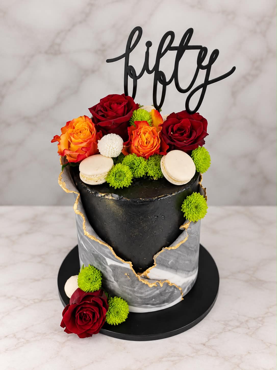 Black and gold 50th birthday celebration cake